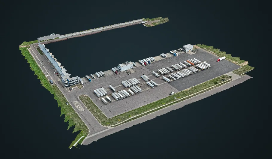 Photogrammetric 3D model of the truck yard and building footprint rendered on black