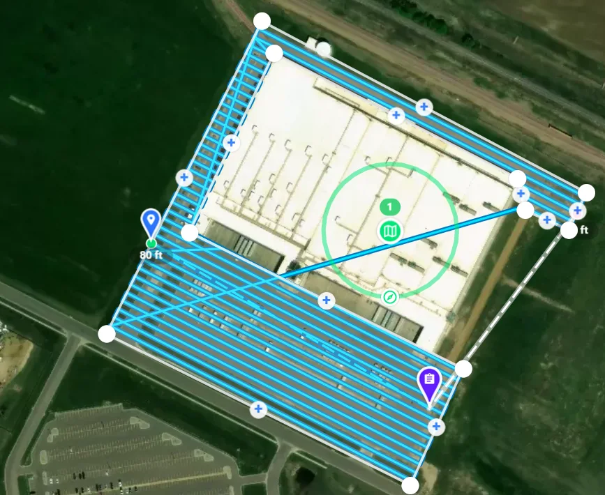 Automated flight plan over the facility: parallel survey lines across the yard and roof, launch point marked